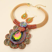 Load image into Gallery viewer, Sensibling Corp. - Bold Teardrop Stone Centered Metal Swirl Embellished Statement Necklace: Clear
