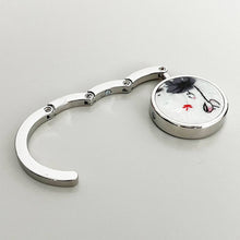Load image into Gallery viewer, Wrapables.com - Wrapables Scenic Purse Hook Hanger, Foldable Handbag Table H: Star Flower
