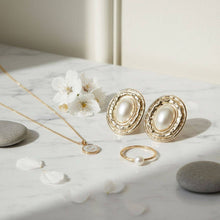 Load image into Gallery viewer, PinktownUSA - Clip On Organic Gold Oval Cream Pearl Earrings: Color: Cream / Plating: Gold / Size: 2.2 x 1.75 inches
