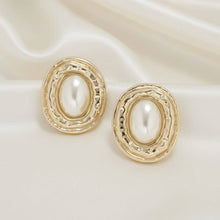 Load image into Gallery viewer, PinktownUSA - Clip On Organic Gold Oval Cream Pearl Earrings: Color: Cream / Plating: Gold / Size: 2.2 x 1.75 inches
