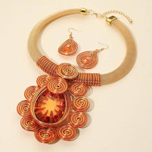 Load image into Gallery viewer, Sensibling Corp. - Bold Teardrop Stone Centered Metal Swirl Embellished Statement Necklace: Yellow
