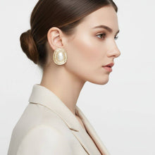 Load image into Gallery viewer, PinktownUSA - Clip On Organic Gold Oval Cream Pearl Earrings: Color: Cream / Plating: Gold / Size: 2.2 x 1.75 inches
